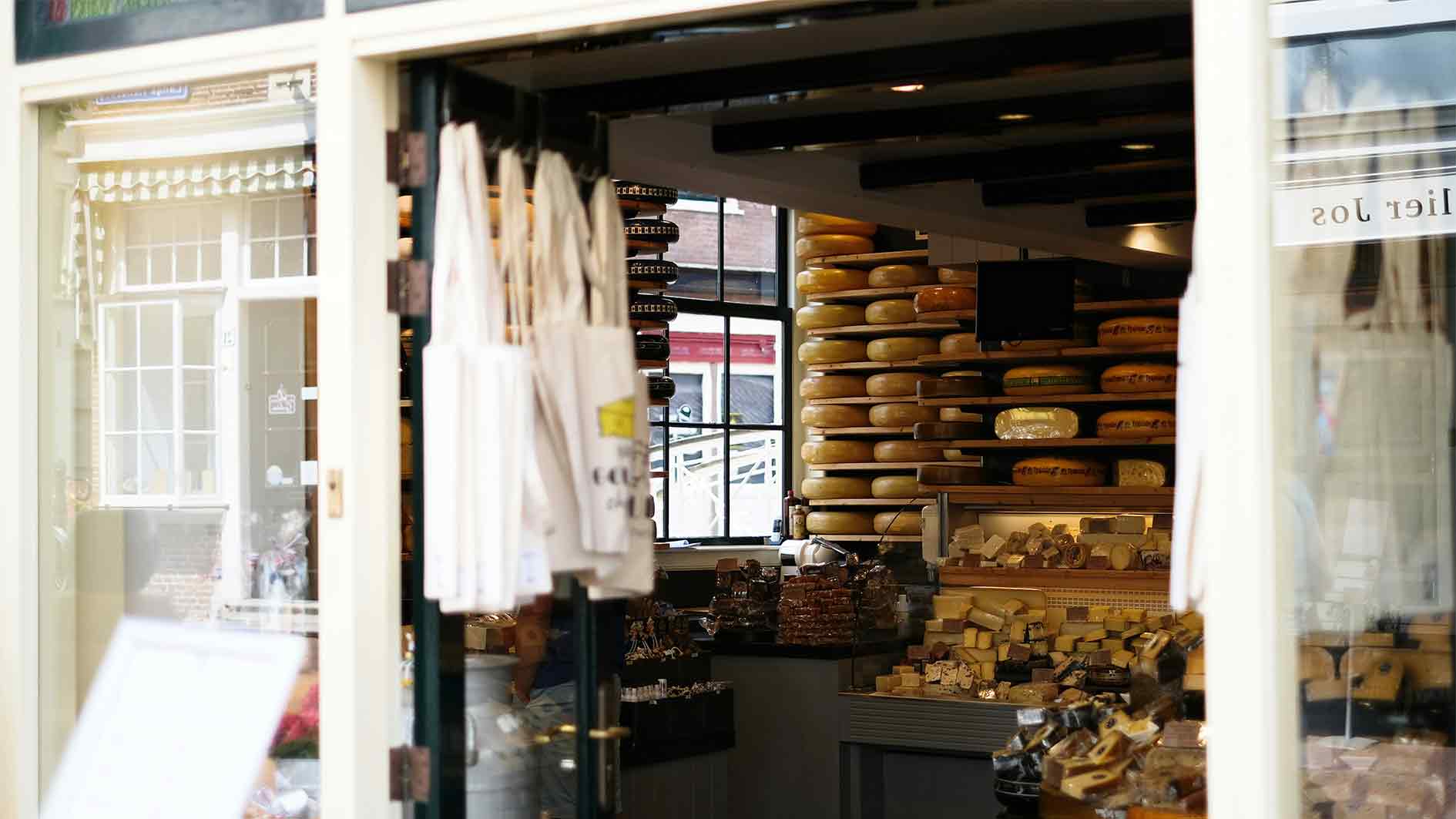an outside picture of a cheese shop
