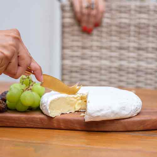 a lsice of camembert on a table